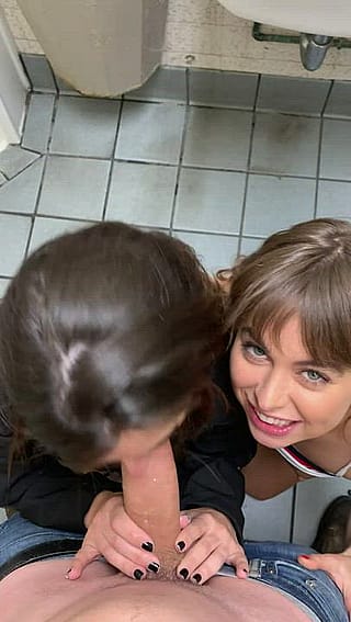 Riley Reid and friend in a bathroom'