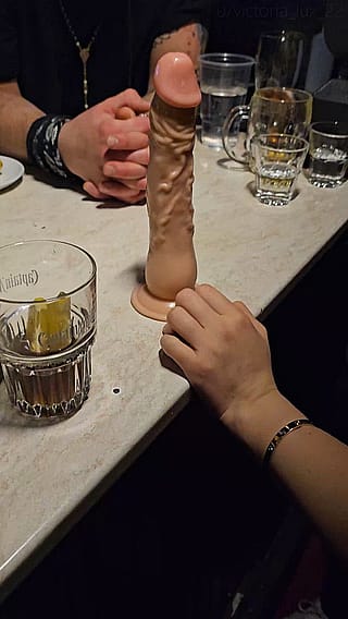 Deepthroated a dildo at the party for a free drink, with titty flash at the end'