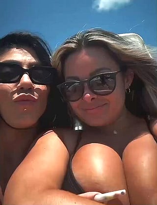 Two Busty Bitches Posing in Bikinis'