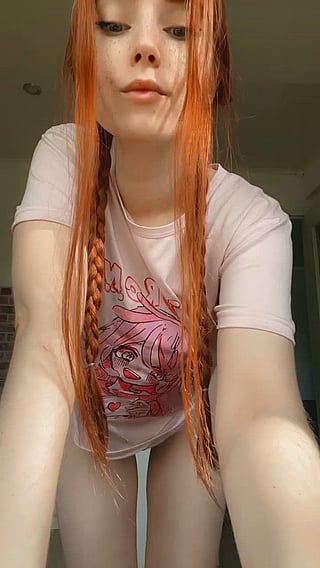 Redhead Teen Dancing in Pink Shirt'