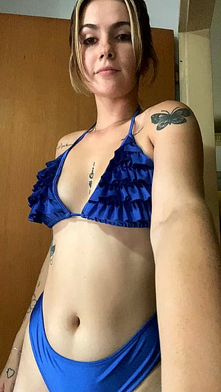 Taste Me: Cute Babe Teasing in Blue Swimsuit'