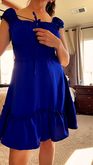Bored Busty Wife Shows Off Her Boobs'