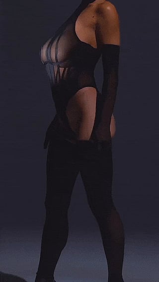Sheer Black: A Model with Huge Tits in Sheer Clothes'