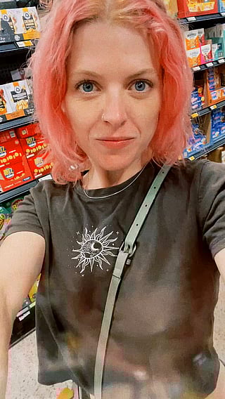 Cute Chick with Nipples Takes Selfie in Shop'
