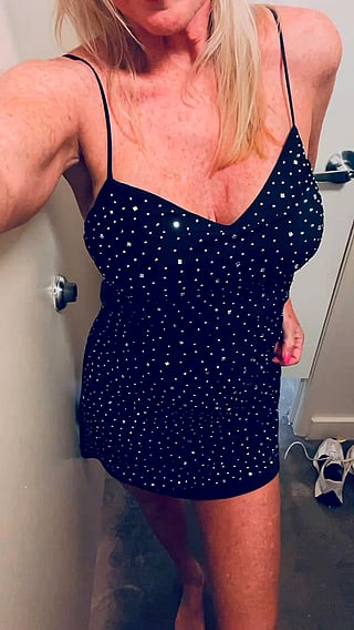 Oh My My, Oh Hell Yes: MILF in Black Dress and Tights Poses for Amateur Video'