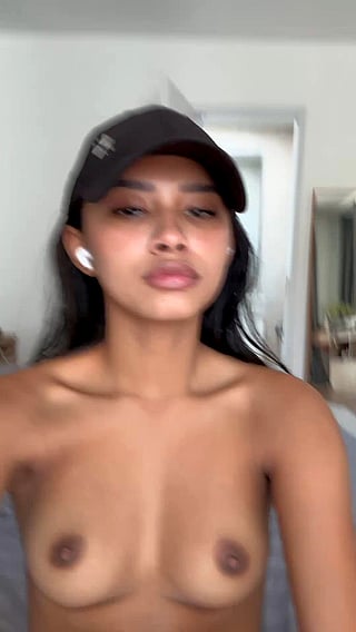 18-Year-Old Asian Babe Shows Off Her Big Ass and Natural Tits'
