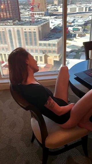 Who is this hot girl getting naked for the camera?'