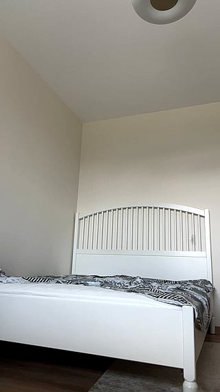 Cute MILF in White Bedroom'