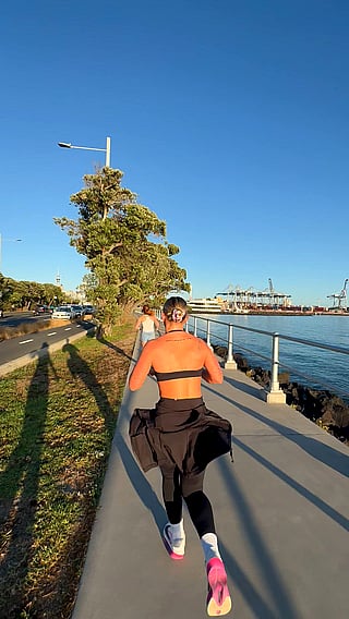 Blonde Babe Runs Alongside Road with Natural Tits Showing'