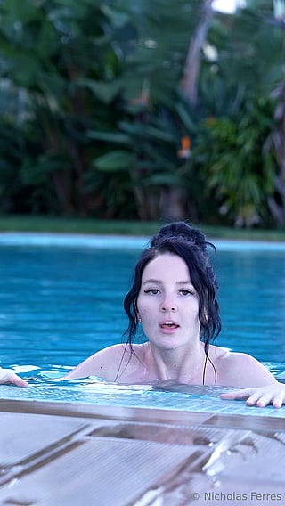 Big Tits Bikini Busty Pool Wet: A Sizzling Video of a Busty Bikini Babe in a Pool'