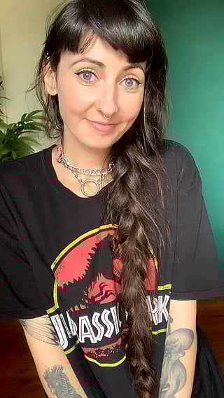 Emo Chick with Dinosaur Tattoo Talks about Her Preferences'