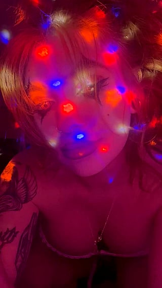 A Fun Freak: Cute Redhead Tease with Tattoo and Tits'