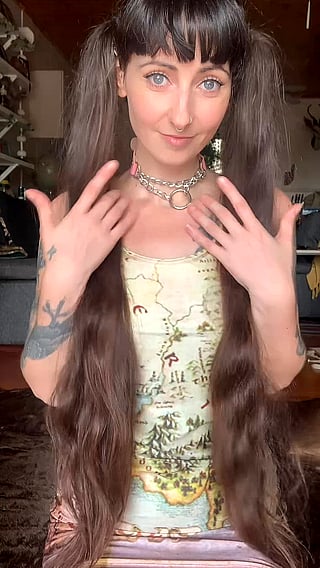Emo Nerd with Tattoos and Collar Shows off her World Map Necklace'