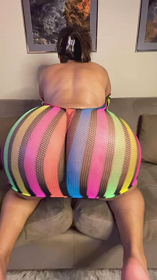 43 and Still Confident with a Big Booty: Ass Clapping in Colorful Stripes'