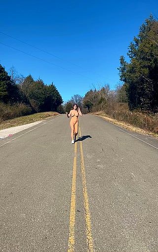 Busty Babe Basking in the Sun: A Sizzling Adventure'