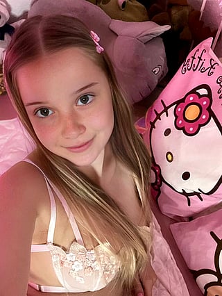 Blonde Babe Takes Selfie in Pink Hello Kitty Bedroom'