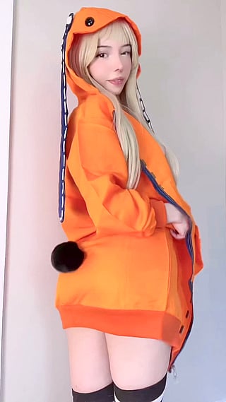 18-Year-Old Asian Girl in Orange Outfit with Big Ass and Small Tits'
