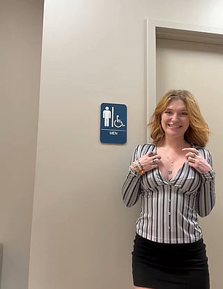 Flashing Tits in Men's Bathroom: Cute Redhead Teases in Public'