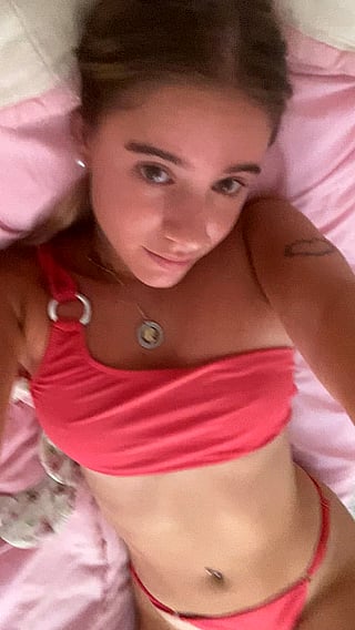 Newbie's First Experience: A Pink Bikini and Tattooed Chest'