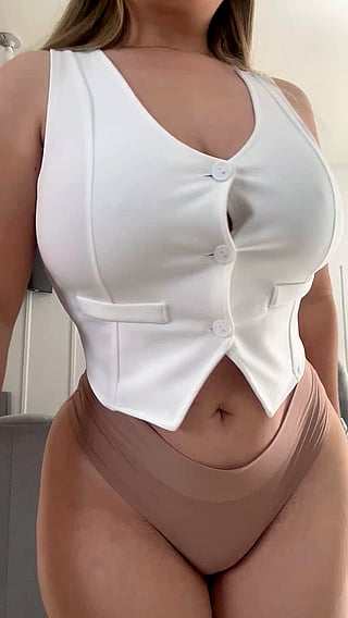 Busty Babe Shows Off Her Big Tits'