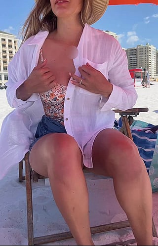 Titty Flash: MILF Exposes Her Boobs for the Camera'