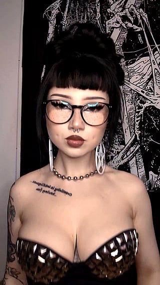 Babe with Big Tits and Boobs Staring into the Camera'