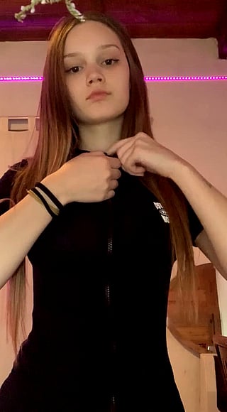 Bouncy Tits - A Woman Adjusting Her Tank Top'