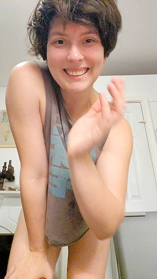 Boob Babe Smiles for the Camera'