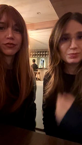Two Redheaded Chicks Flashing Their Boobs'
