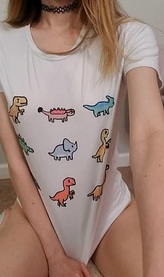 A cute dinosaur shirt and perky titty drop'