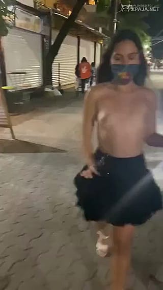 Colombiana Dances Topless in the Streets'